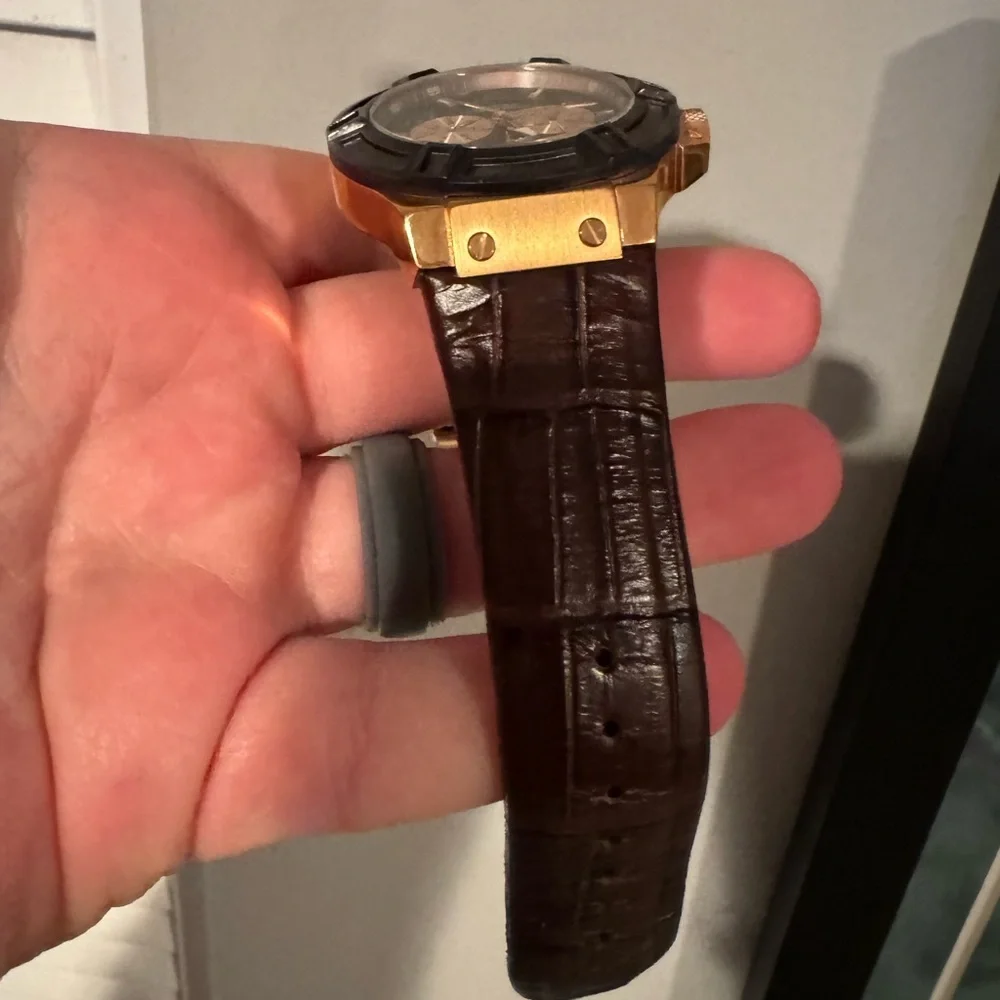 Guess men’s gold brown leather watch